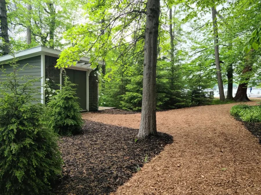 Mulched garden beds on a rural Eau Claire, Michigan property